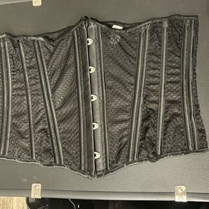 Amazon; Fishnet,waist corset, silver busk closure with lacing in the back 2X